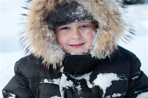 Boy With Snow On Her Face Stock Image Image Of Jacket 28819513