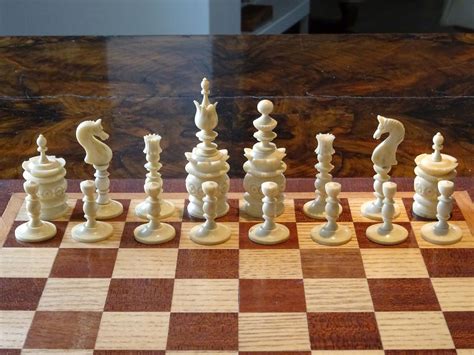 A Chess Board With Several Pieces On It