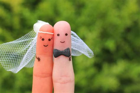 fingers art of happy couple to get married concept of wedding ceremony mixed race couple stock