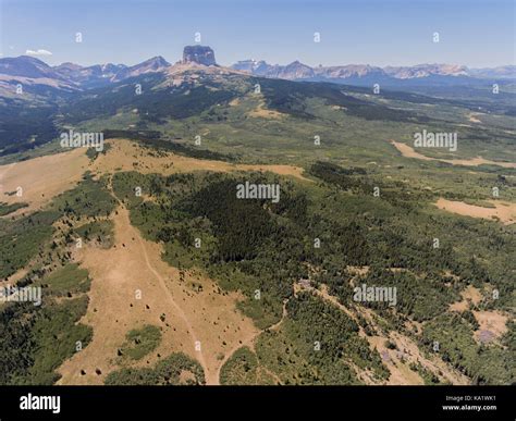 Aerial View To West Of Chief Mountain And The Rocky Mountain Front From