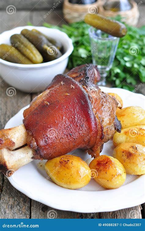 Appetizing Bavarian Roast Pork Knuckle On Cutting Board Stock Image