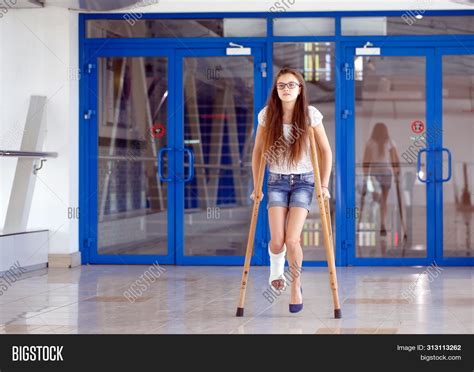 Young Girl On Crutches Image And Photo Free Trial Bigstock