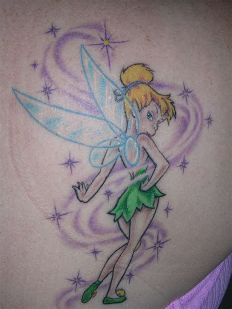 Fairy tinkerbell tattoos have been finished with all the lace dressed in the blue or green dress with quite appealing wings. Tinkerbell Tattoos Designs, Ideas and Meaning | Tattoos ...