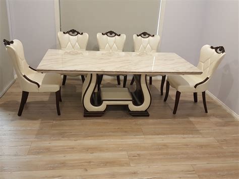 The table looked as though it had been all just thrown in the box. Ferrara Marble Dining Table with 8 Chairs | Marble King