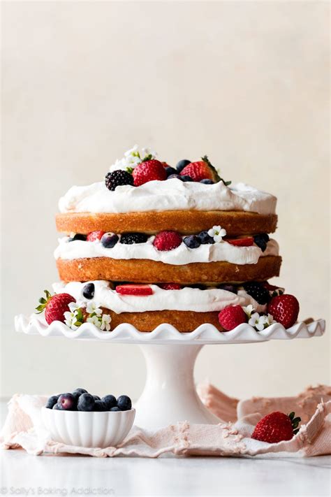 Soft And Sweet White Cake Between Layers Of Fluffy Homemade Whipped Cream And Juicy Fresh