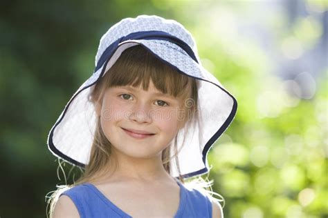 Close Up Portrait Of Happy Smiling Little Girl In A Big Hat Child