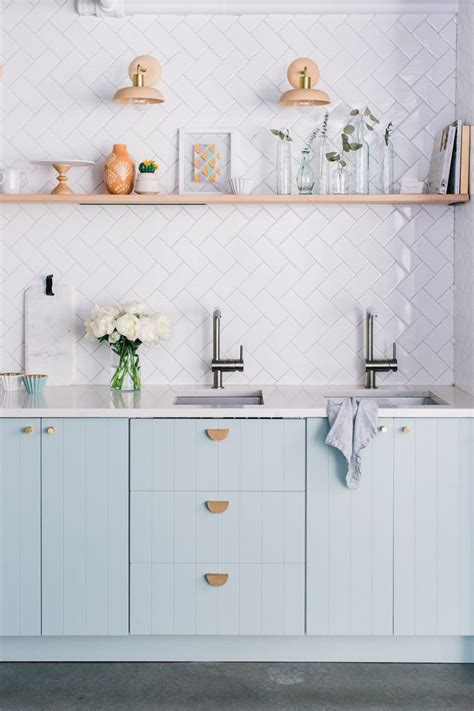 Simply choose a kitchen cabinet then put a vanity tops on it to transform it into a bathroom vanity cabinet. The Easiest Way to Make IKEA Cabinets Look High-End | Blue kitchen cabinets, Light blue kitchens ...