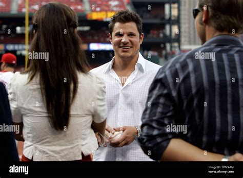 Singer Nick Lachey Center Prepares To Throw Out The First Pitch