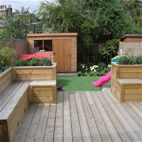 Small garden designs ideas for london. Greenroom Landscaping - decked garden with raised planters ...