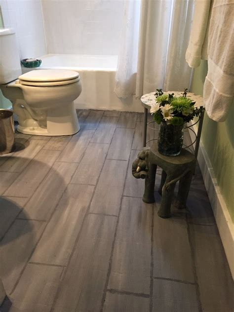 This bathroom happened to have an old pink tile floor with a thick mortar bed under it so removing it was a bit of a challenge. Bathroom Floor Tile or Paint? | Painting linoleum floors ...