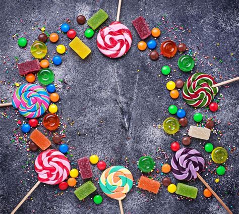 Premium Photo Assortment Of Colorful Candies And Lollipops