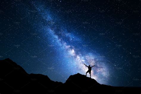 Milky Way With Silhouette Of A Man Stock Photo Containing Landscape And