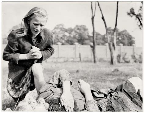 A Ten Year Old Polish Girl Named Kazimiera Mika Mourns The Death Of