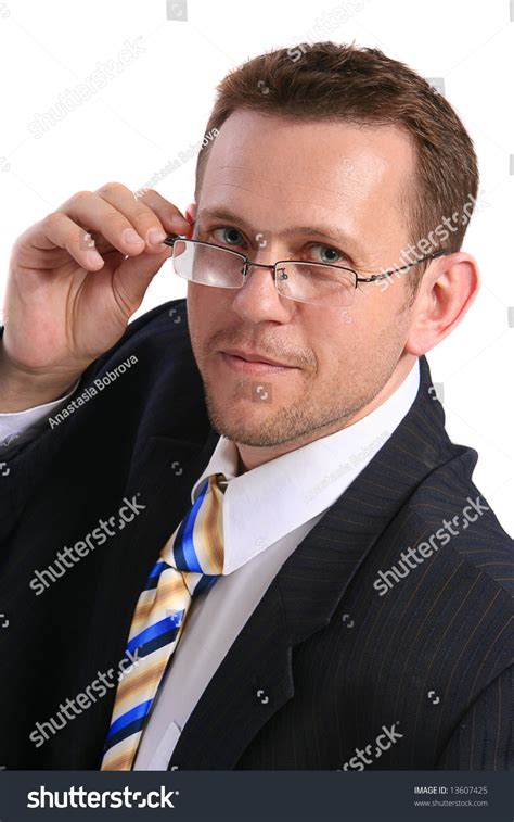 Businessman Holding His Glasses Stock Photo 13607425 Shutterstock