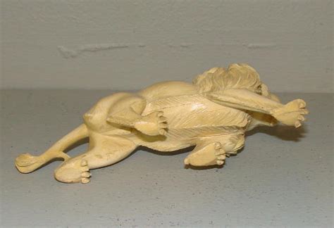 Two Carved Ivory Animals A Fierce Looking Lion 1347518