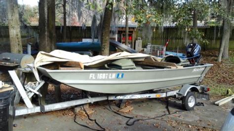 12 Seaark Aluminum Jon Boat With Galvanized Trailer And 35 Hp Motor