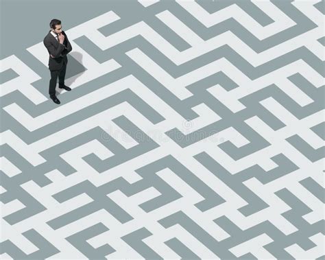 Businessman Standing On A Maze And Searching For A Way Out Stock Image