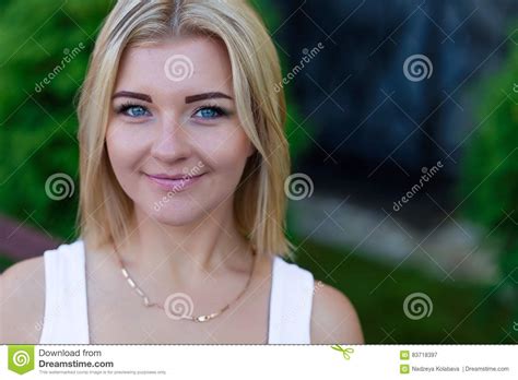 Portrait Of A Beautiful Blonde Outdoors In Summer Stock Image Image