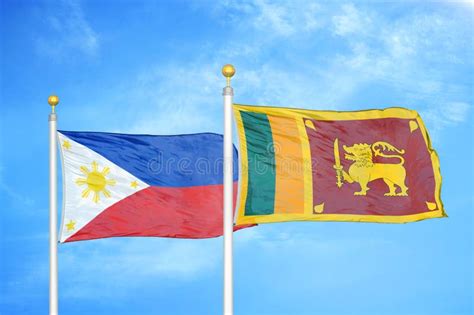 Philippines And Sri Lanka Two Flags On Flagpoles And Blue Cloudy Sky