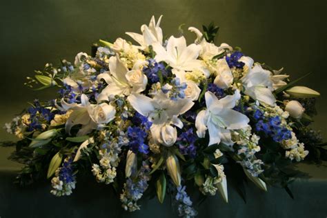 Blue And Cream Casket Spray Funeral Floral Funeral Floral Arrangements