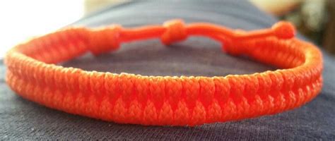 It contains about 12 feet of paracord. Neon orange #95 paracord fishtail braid bracelet with a sliding knot | Bracelets, Sliding knot ...
