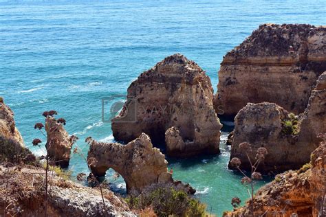 Cliffs And Rock Formations At Ponta Da Piedade Beach In Lagosportugal