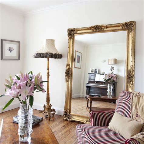 6 clever ways to use mirrors to make your home feel bigger and brighter living room mirrors