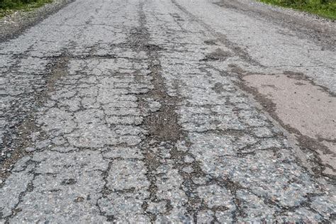 Damaged Road With Cracked Asphalt Stock Photo Image Of Pavement