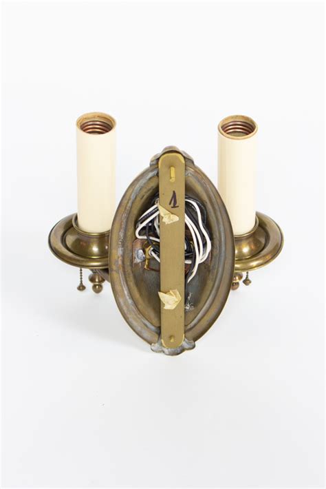 Two arm wall sconce with square mounting plate; Two Arm Antique Brass Sconce - Appleton Antique Lighting