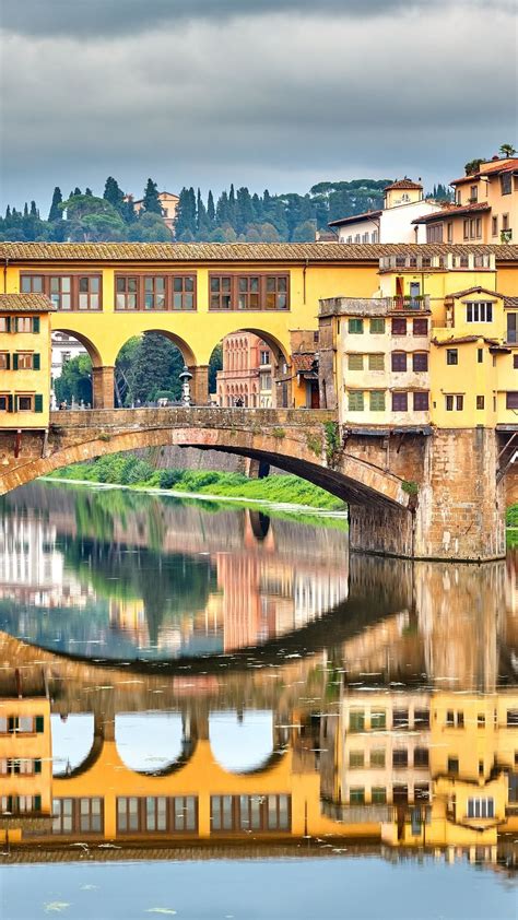 Ponte Vecchio Bridge Over The Arno River In Florence Italy Backiee