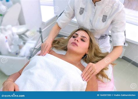 Cosmetologist Is Preparing Client Woman To Cosmetic Beauty Procedure