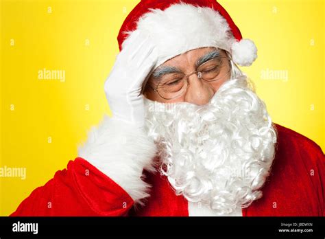 Santa Claus Suffering From Headache Stock Photo Alamy