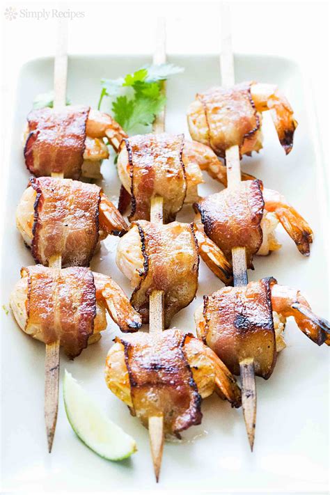 This is one easy crowd pleaser, with only 4 ingredients! Bacon-Wrapped Shrimp Recipe | SimplyRecipes.com