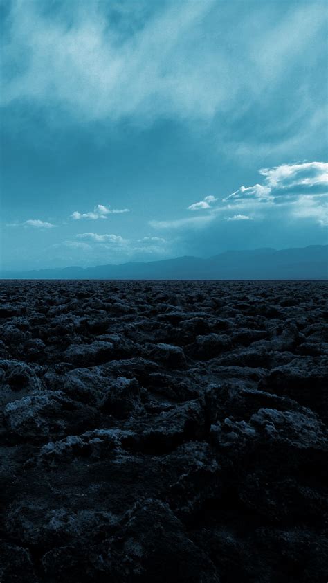 Download Wallpaper 1080x1920 Desert Stones Mountains Fog Landscape