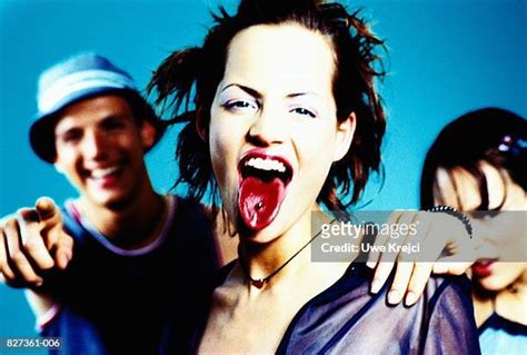 tongue piercing girl photos and premium high res pictures getty images