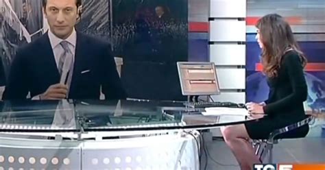 News Presenter Forgets She S Sitting At A Glass Desk And Gives Viewers
