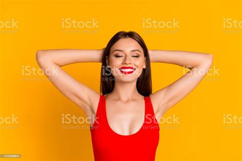 photo of dreamy cute lady dressed bodysuit closed eyes arms behind head isolated yellow color
