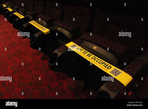 Social Distancing Markers Are Seen Inside A Theatre Hall Ahead Of The