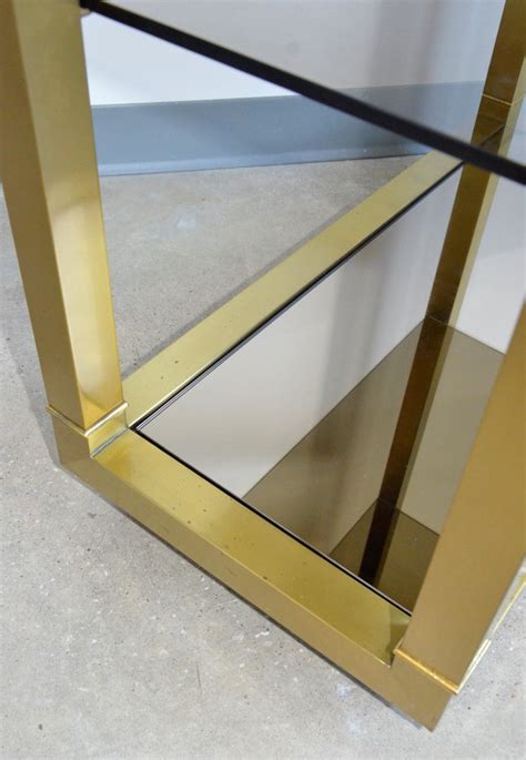 chinoiserie mastercraft style brass with smoked and mirrored glass shelves Étagère at 1stdibs