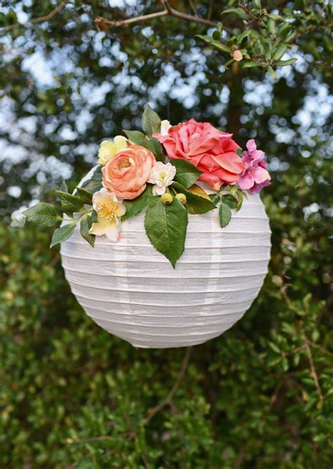 Wedding arches make the most beautiful backdrops when you say your vows. DIY Flower Paper Lanterns Tutorial - Make Life Lovely