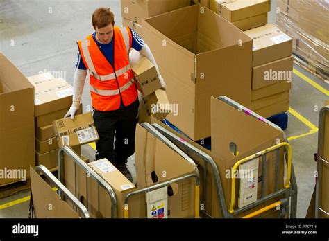 Stock pickers in the Amazon Fulfillment Centre warehouse in Swansea