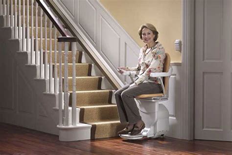 A chair or lifting platform is attached to the rail. Anderson, IN: Stairlifts, Chairlifts, Home Elevators ...