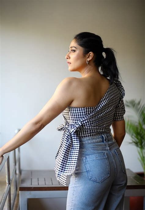 Regina Cassandra Promotes Chakra In A Checkered Top And Jeans