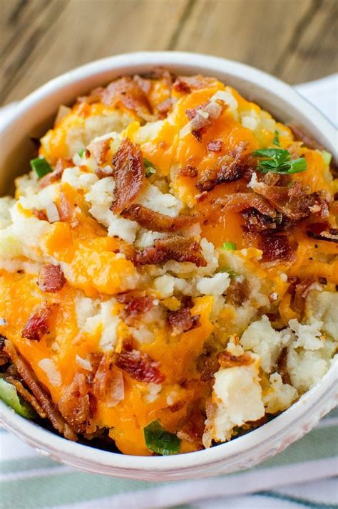 The potatoes are purchased, washed, peeled, sliced, cooked, and mashed with a potato masher or mixer. Loaded Crock Pot Mashed Potatoes Recipe! - Tammilee Tips