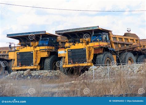 Huge Yellow Dump Trucks On Parking Near Quarry Stock Photo Image Of
