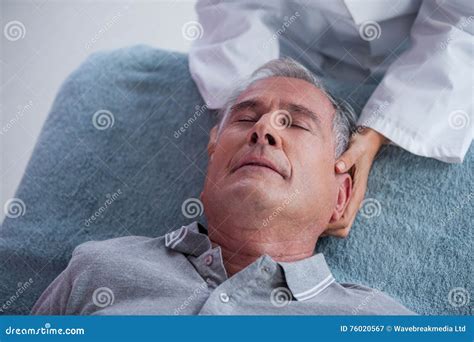 Senior Man Receiving Neck Massage From Physiotherapist Stock Image Image Of Acupressure