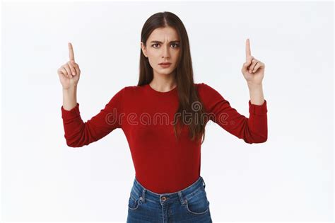 Serious Looking Alarmed And Worried Frustrated Brunette Woman In Red
