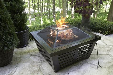 Where are the west coast fire pits located? A large wood burning fire pit with adjustable feet ...