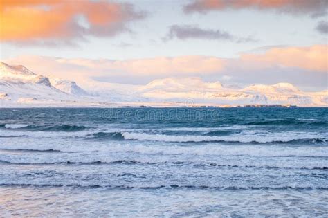 Scenic Winter Atlantic Ocean Coast At Sunset Snow Covered Mountains In