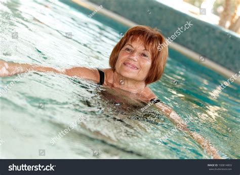 Mature Lady Swimming At Swimming Pool Stock Photo 100814803 Shutterstock